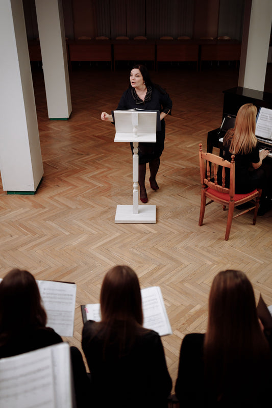Woman Band Director at Podium
