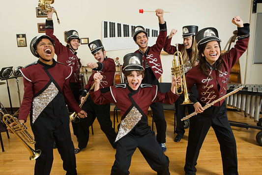 7 enthusiastic band kids yelling happily