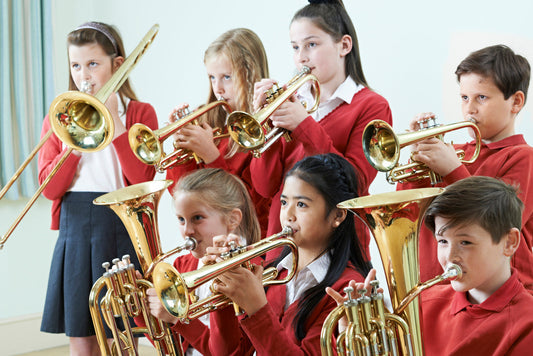 kids playing band instruments