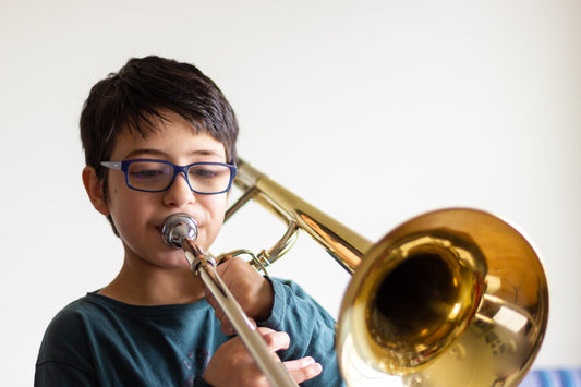 boy playing trombone