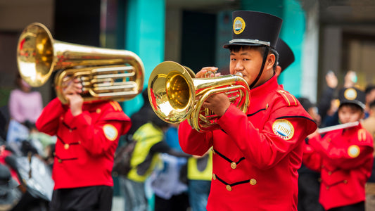 Brass players marching in parade