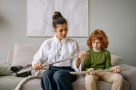 Flute teacher with student
