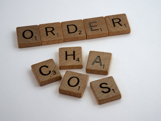 Scrabble Tiles with Order and Chaos spelt