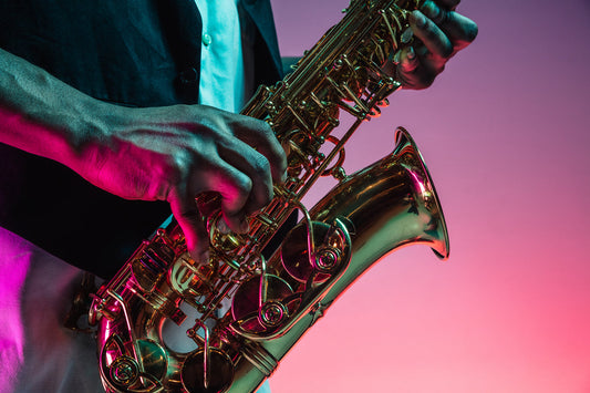 Close up of sax player with cool background lighting
