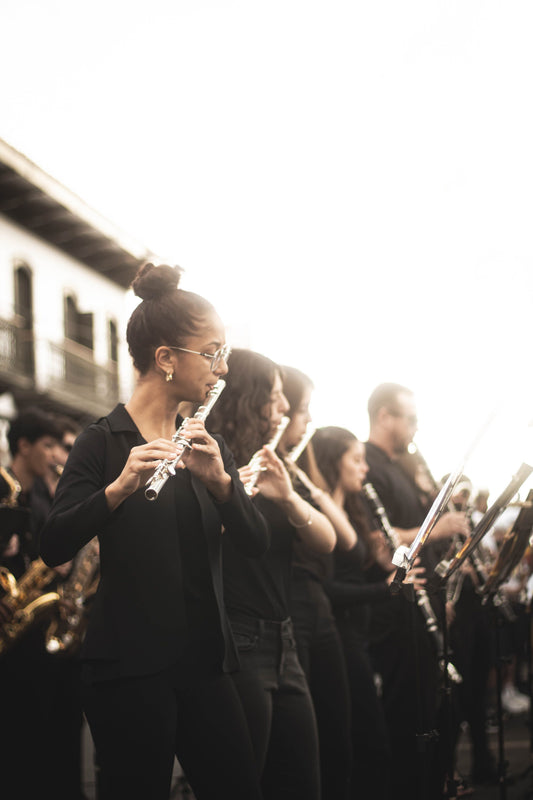 girls playing flute and clarinet