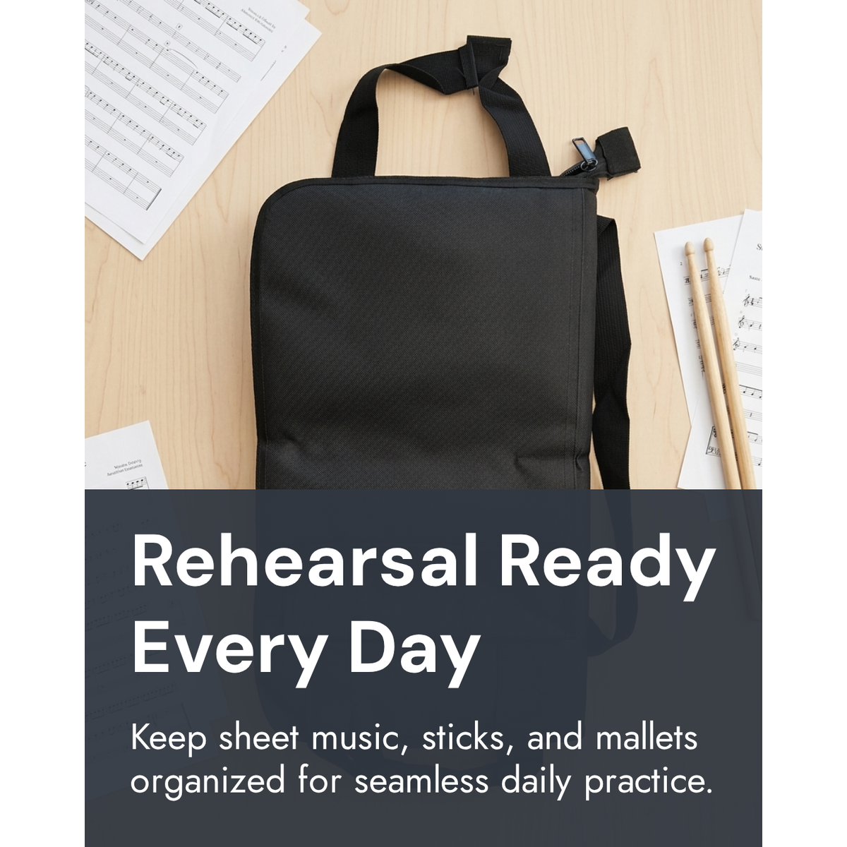 Rehearsal Ready Every Day – black drumstick bag on a table with sheet music and drumsticks