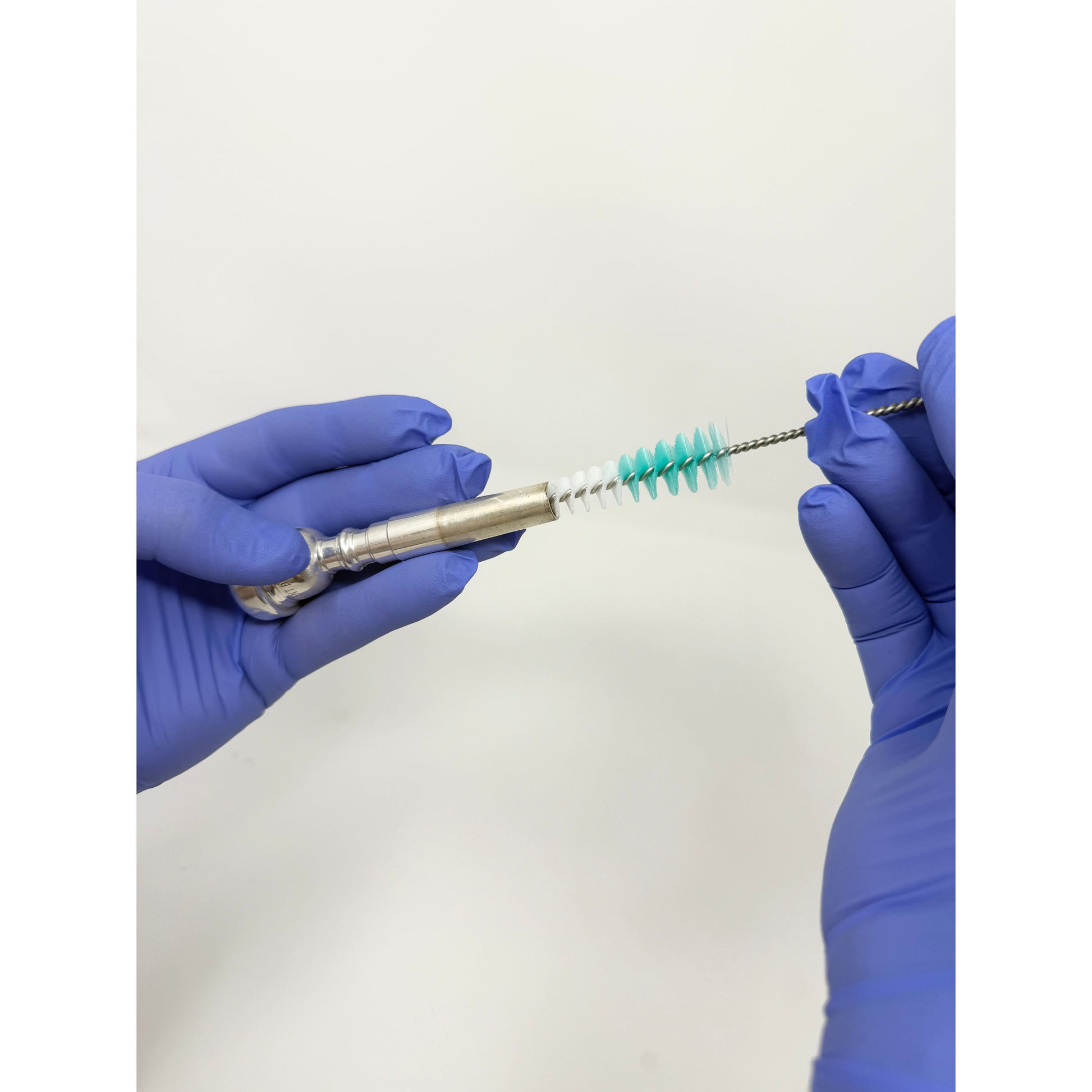 Conical brush for cleaning a trumpet mouthpiece, alternate view